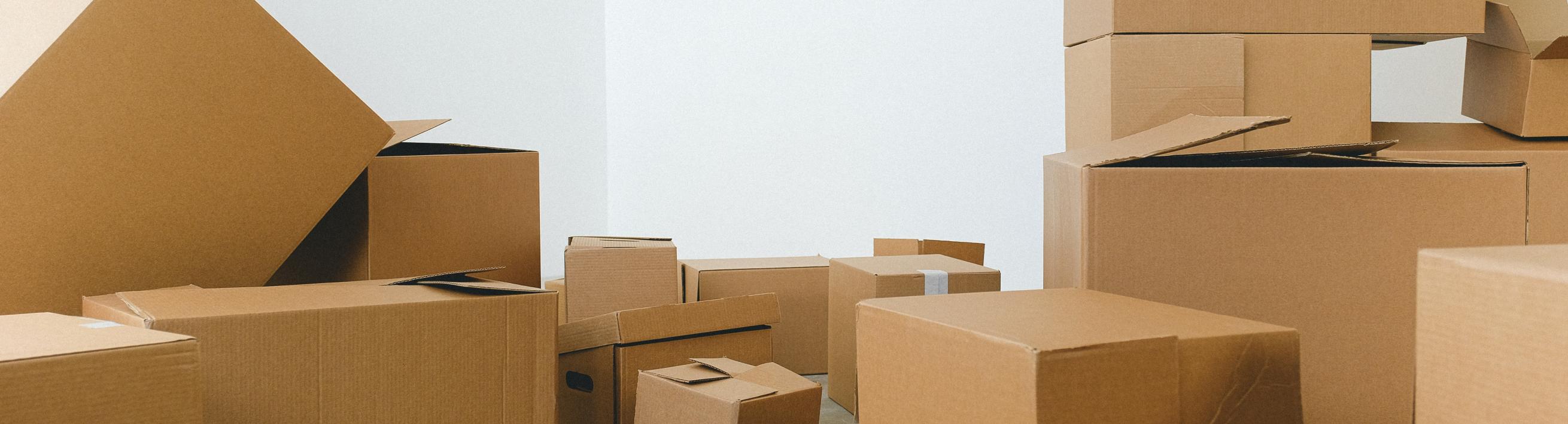 Boxes of various sizes in a room.