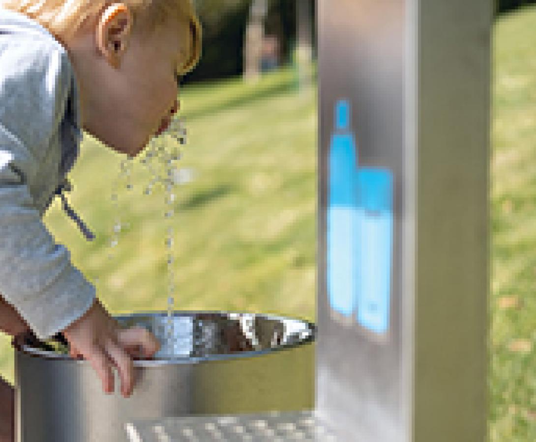 kids drinking from drinking fountains