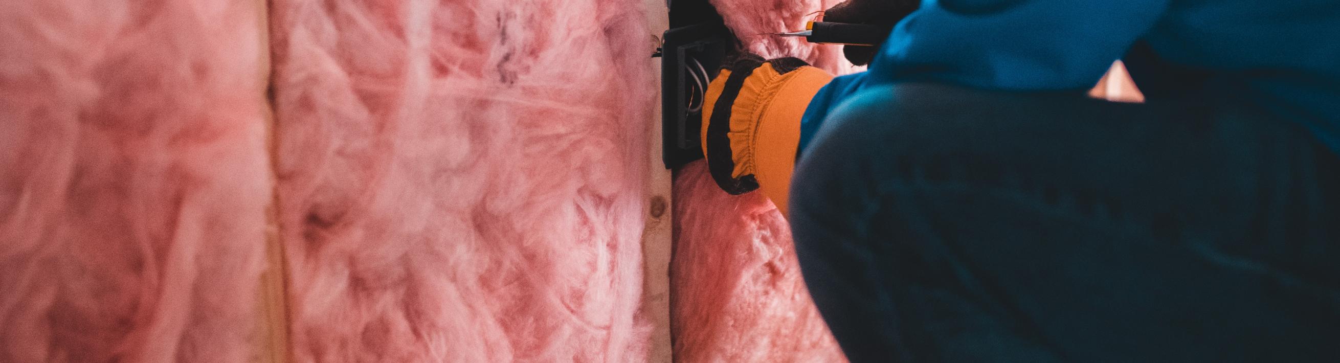 Power tool being used on insulation