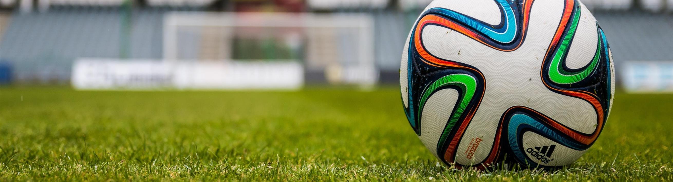 A soccer ball on a sports field