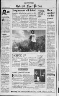 A scan of a newspaper article from the Detroit Free Press featuring one titled Mopping Up