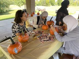 Pumpkin Painting Washtenaw Refugee Welcome Event