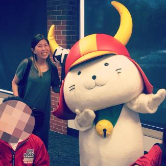 Photo of Yuki with Hikonyan, the mascot for Hikone City