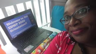 Crystal Zander More Life Less Stuff Writer and her laptop outside